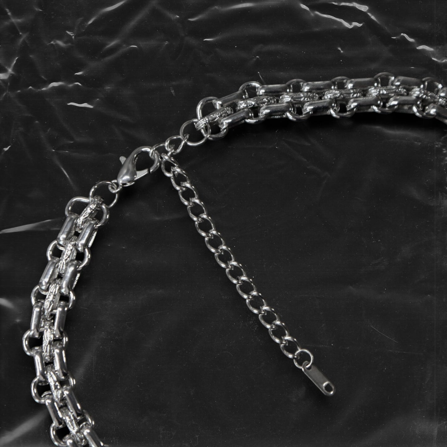 Chockychoker "Button Riot" Choker
Crafted with a bold silver chain base, this choker is adorned with a playful mix of oversized and small multicolor vintage metal buttons and silver-toned star charms. Like a vibrant button explosion, the design fuses Y2K, gothic kawaii, and playful aesthetics , perfect for lovers of colorful layering, creative styling, and expressive fashion.